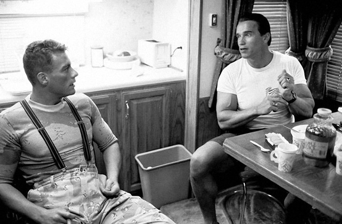 Arnold Schwarzenegger visiting Jean-Claude Van Damme on the set of the film Universal Soldier, 1991. - Arnold Schwarzenegger, Jean-Claude Van Damme, Franco Colombo, Universal Soldier, Text, Longpost