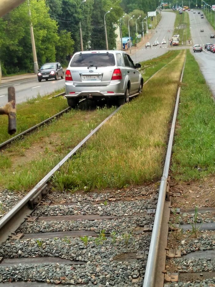 Agile autolady of Izhevsk - Woman driving, Izhevsk, Tram