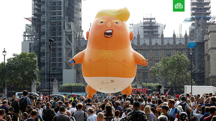 A giant aerial caricature of the President of the United States was raised into the sky over London - Trump, , Donald Trump
