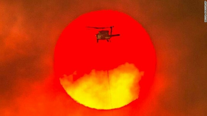 This photo was taken in California. - The sun, Helicopter, The photo