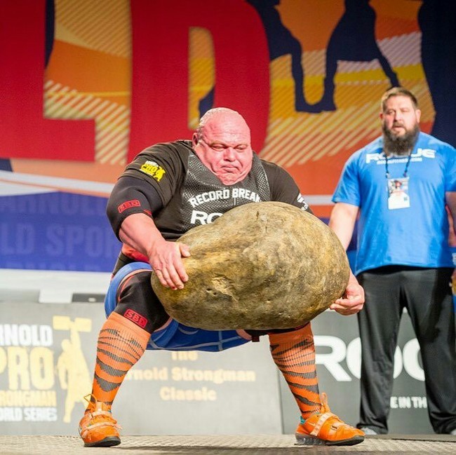 A farmer demonstrates a record-breaking potato - Arnold Classic, Strongman, A rock, Reddit