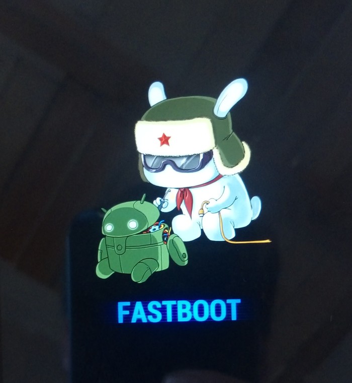 Как убрать фаст бот. Xiaomi заяц Fastboot. Fastboot на экране Xiaomi. Xiaomi заяц в ушанке Fastboot. Заяц андроид Fastboot.