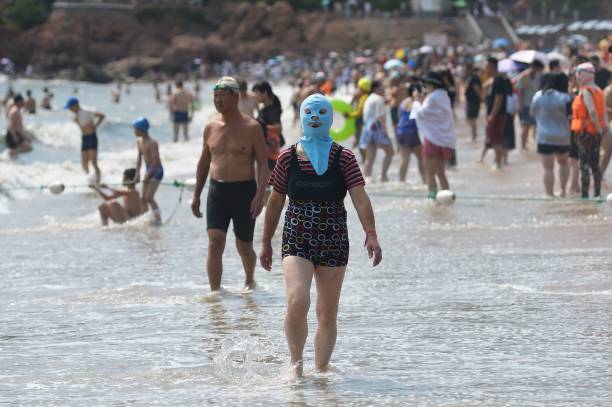 Facekini, increasingly gaining popularity on the beaches of China... . - China, Chinese, Swimsuit, Costume, Mask, Oddities, Interesting, , Longpost