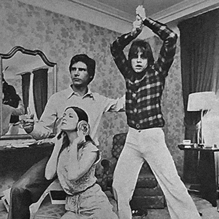 Harrison Ford, Carrie Fisher and Mark Hamill parody a Star Wars poster, USA, 1977. - From the network, Star Wars, Harrison Ford, Carrie Fisher, Mark Hamill, Old photo, Celebrities
