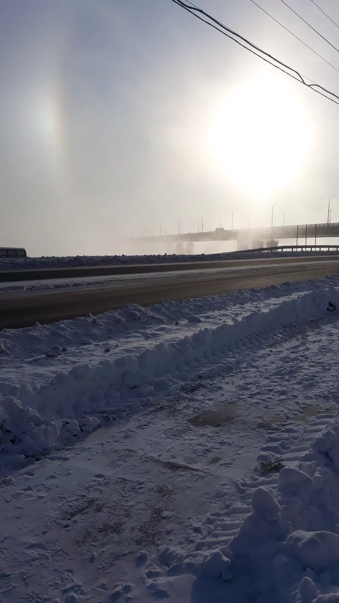 Bridge to nowhere. First frosts - freezing, Siberia