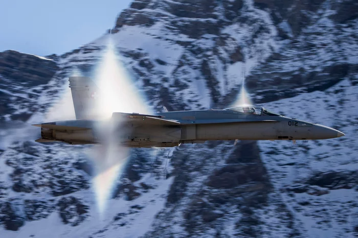 F/A-18 Hornet breaks the sound barrier - Sound barrier, Airplane, Air force, Switzerland, Alps, The photo, The mountains
