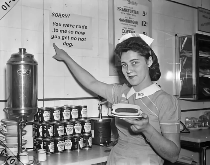 If you're rude to the salesman, then you don't have a hot dog. - USA, Black and white photo, Retro, Salesman, Girls, English language, Announcement, Hot Dog