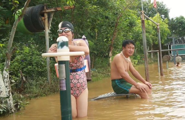 Rain is no problem for charging - Vietnam, And we don't care., Flooding, Charger