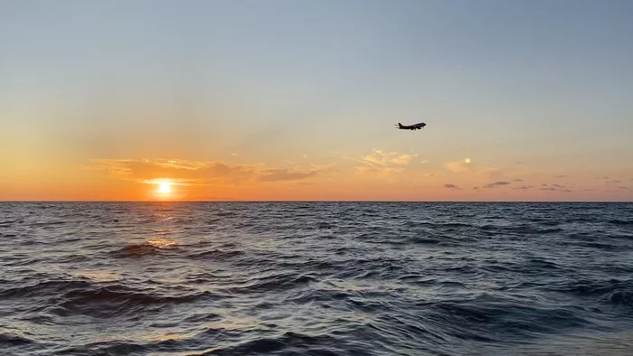 Behind the wing of the plane, the azure sea is singing about something:3 - My, Sea, Airplane, Sunset