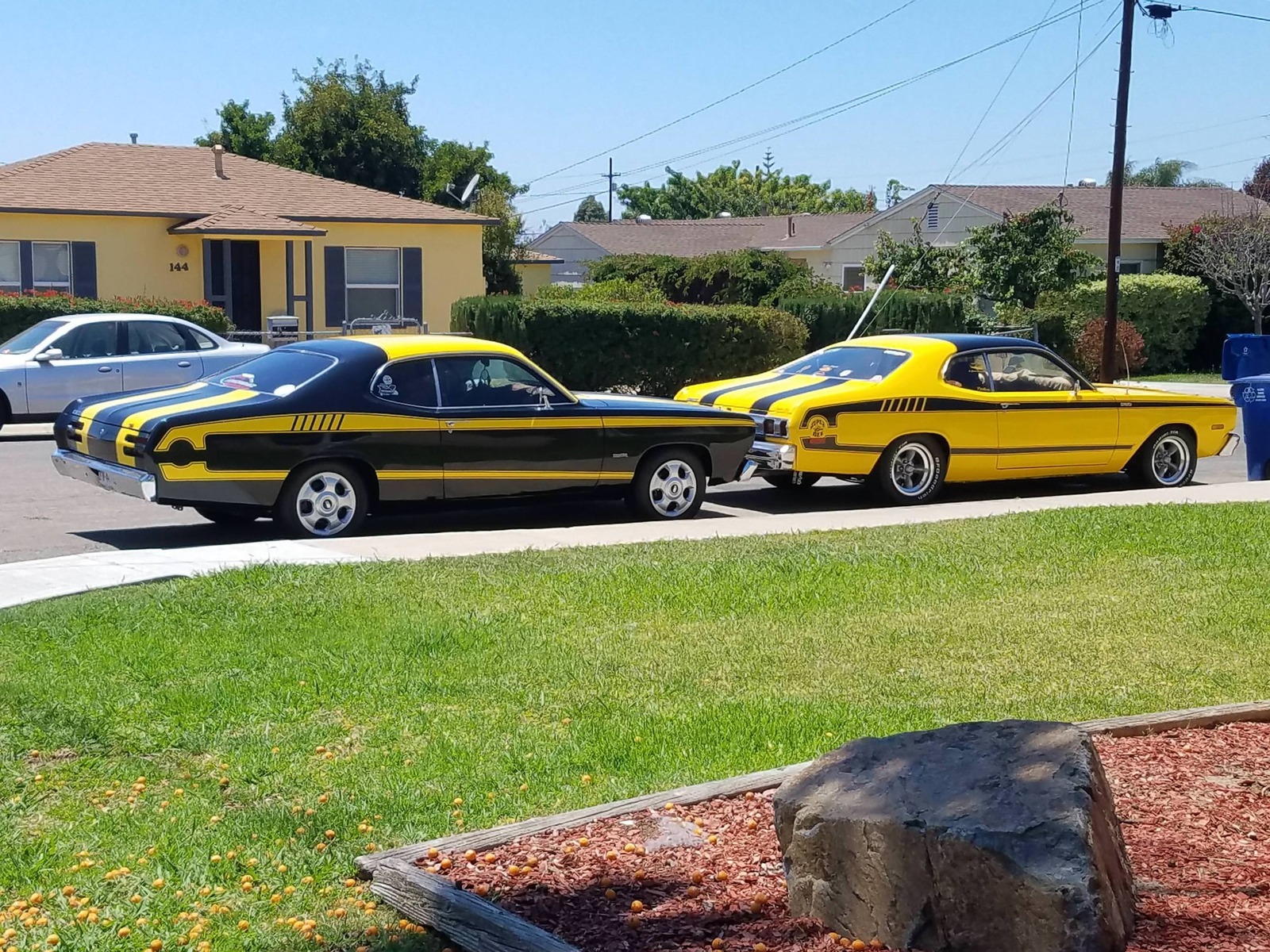 My neighbor has two identical cars painted exactly opposite to each other. - Reddit, Car, The photo