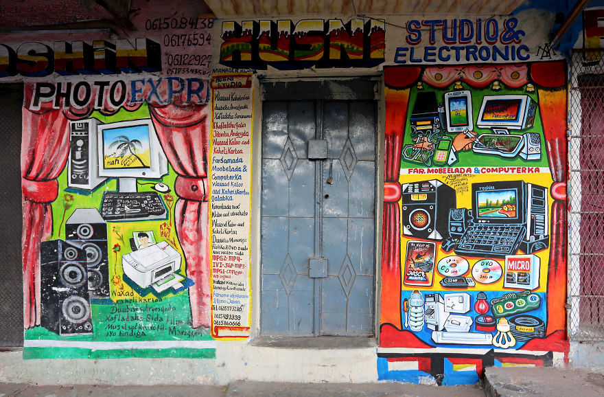 In Somalia, shop fronts are painted in such a way that illiterate residents can easily understand what they are selling there. - My, Somalia, Longpost, Street art, Artist