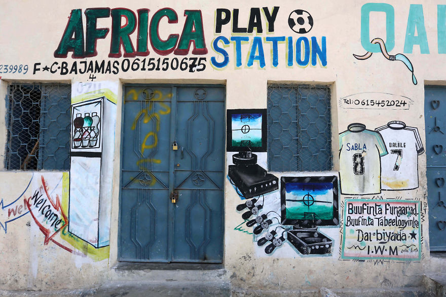 In Somalia, shop fronts are painted in such a way that illiterate residents can easily understand what they are selling there. - My, Somalia, Longpost, Street art, Artist