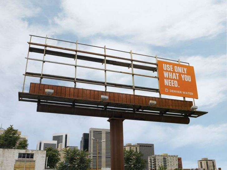 Denver Water's clever billboard: Use only what you need. A corner of a billboard was enough for this advertisement. - Advertising, Billboard, What you need