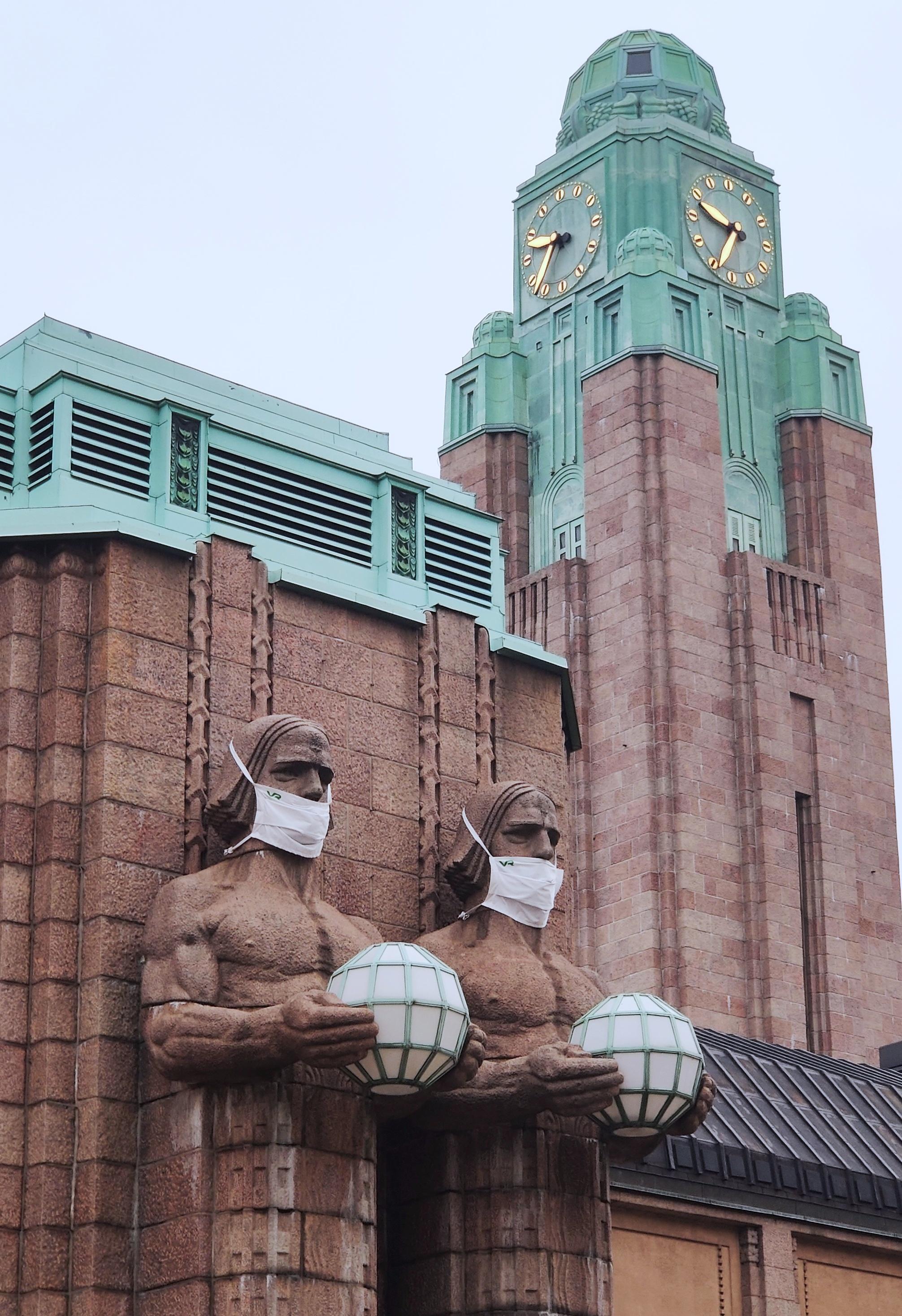 Central railway station in Helsinki - Helsinki, Finland, Railway station, Sculpture, Social advertisement, Medical masks